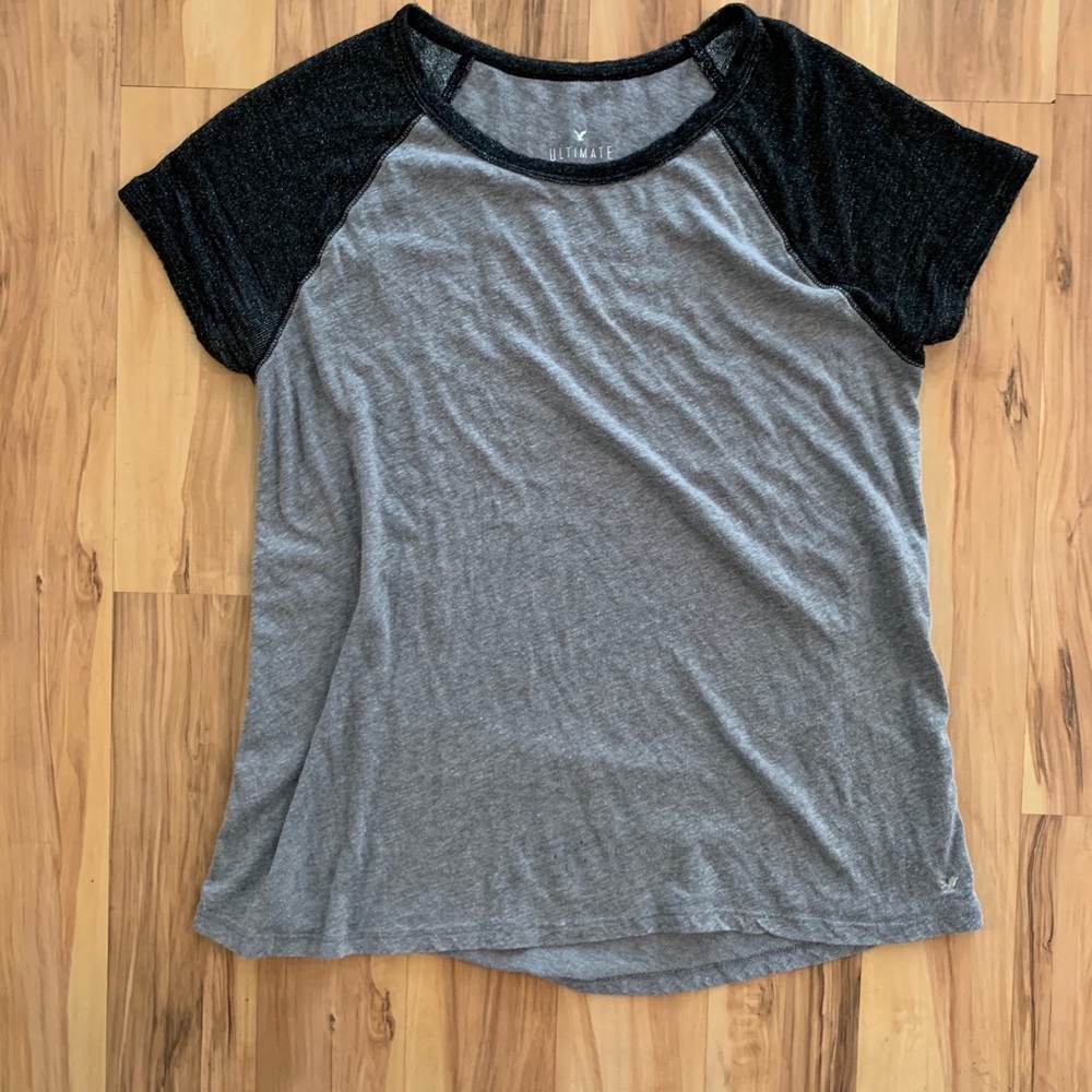 American Eagle T Shirt with Sparkle sleeves.